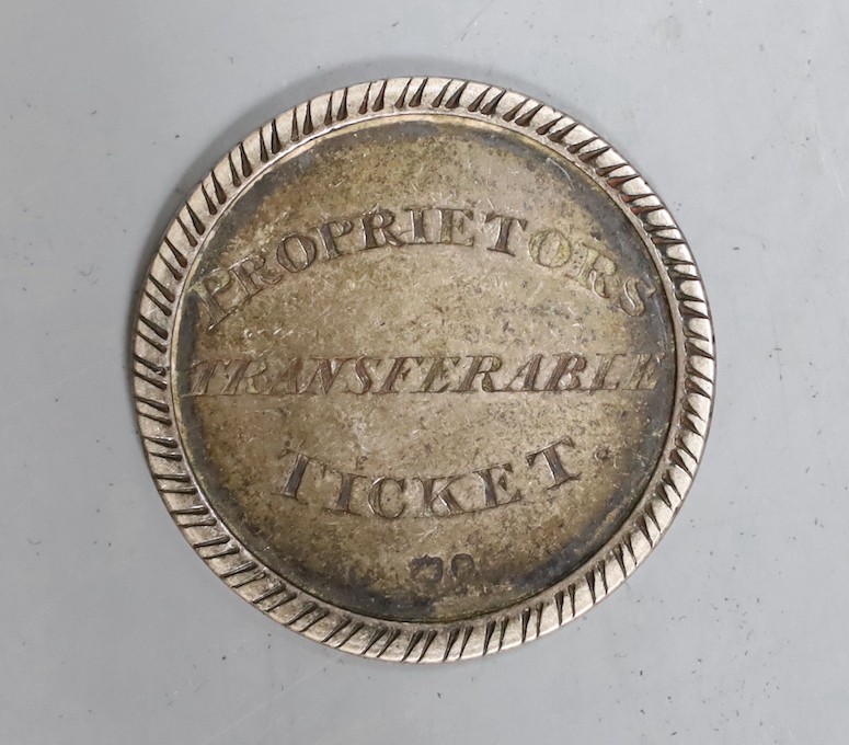 A late George III silver theatre ticket inscribed 'Proprietors Transferable Ticket', verso '29th Sept. 1819 Yarmouth Theatre Edmund Prescott Esq, No.2' diameter 39mm.